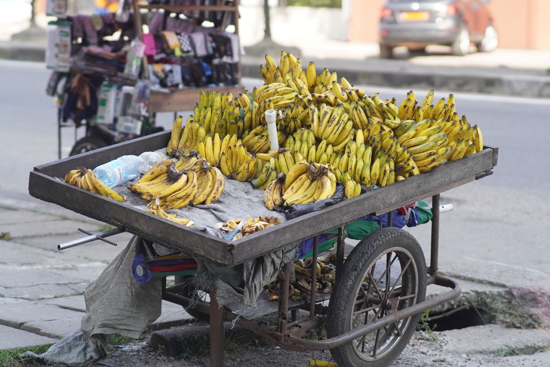 A street vendor's cart of bananas in Douala, Cameroon.